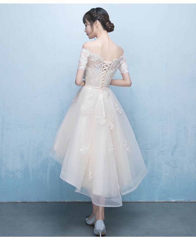 ชุดราตรี หน้าสั้นหลังยาว เปิดไหล่ แขนสั้น สีครีม งานร้อยหลัง Size XL