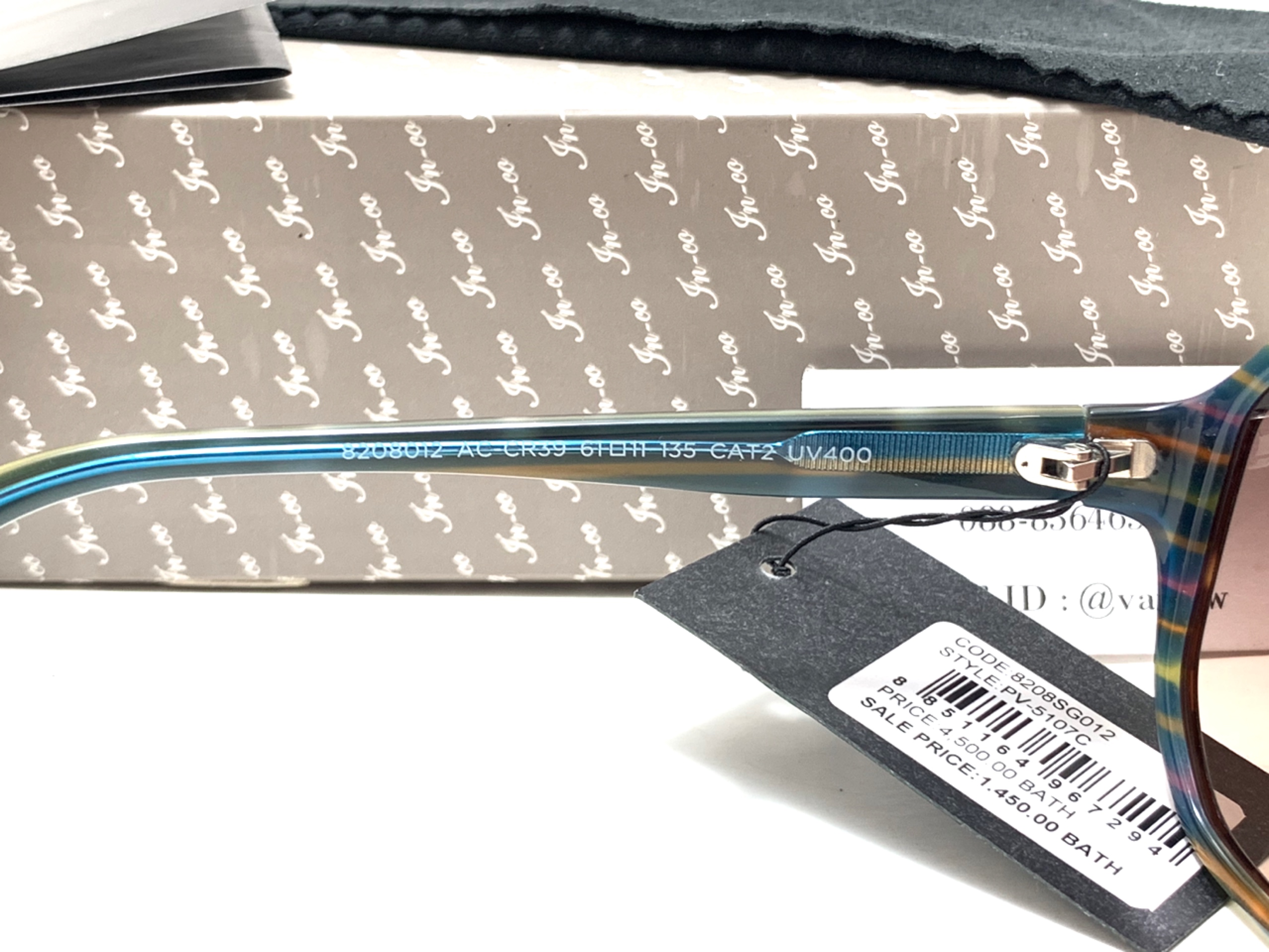 แว่นกันแดด FN-CO 8208012 AC-CR39 61-11-135 CAT2 <กระ>