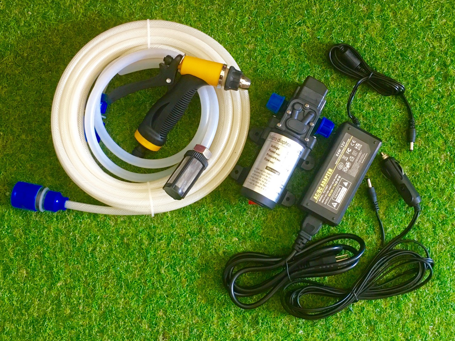 ชุดปั๊มน้ำล้างรถ ปั๊มน้ำ 12 โวลต์ DC12V 9 บาร์ ( ใช้ได้ทั้งไฟบ้านและที่จุดบุหรี่ )