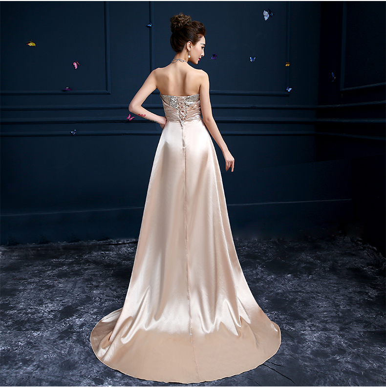 ชุดราตรี หน้าสั้นหลังยาว สีทองอ่อน Size L ผ้ากลิตเตอร์ ด้านนอกเปนผ้าซาติน เชือกร้อยหลัง