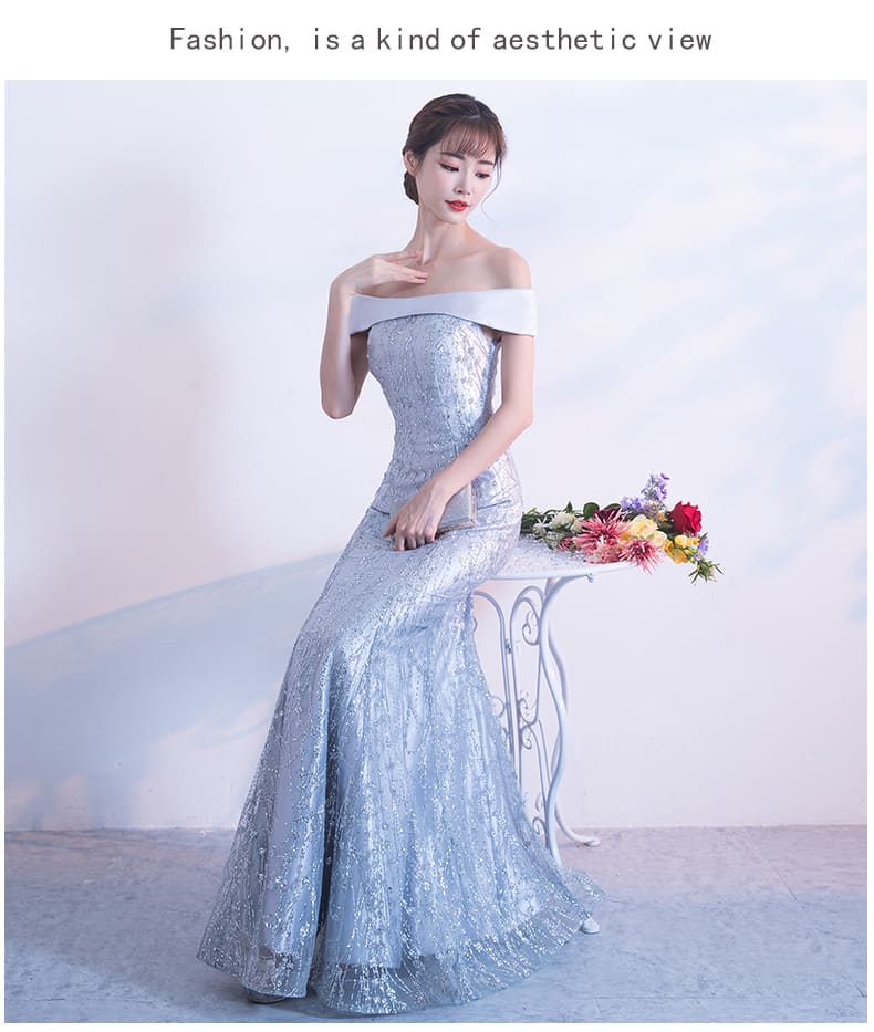 ชุดราตรียาว ไหล่ปาด สีเทาเงิน ผ้ากลิตเตอร์ งานร้อยหลัง พร้อมส่ง L