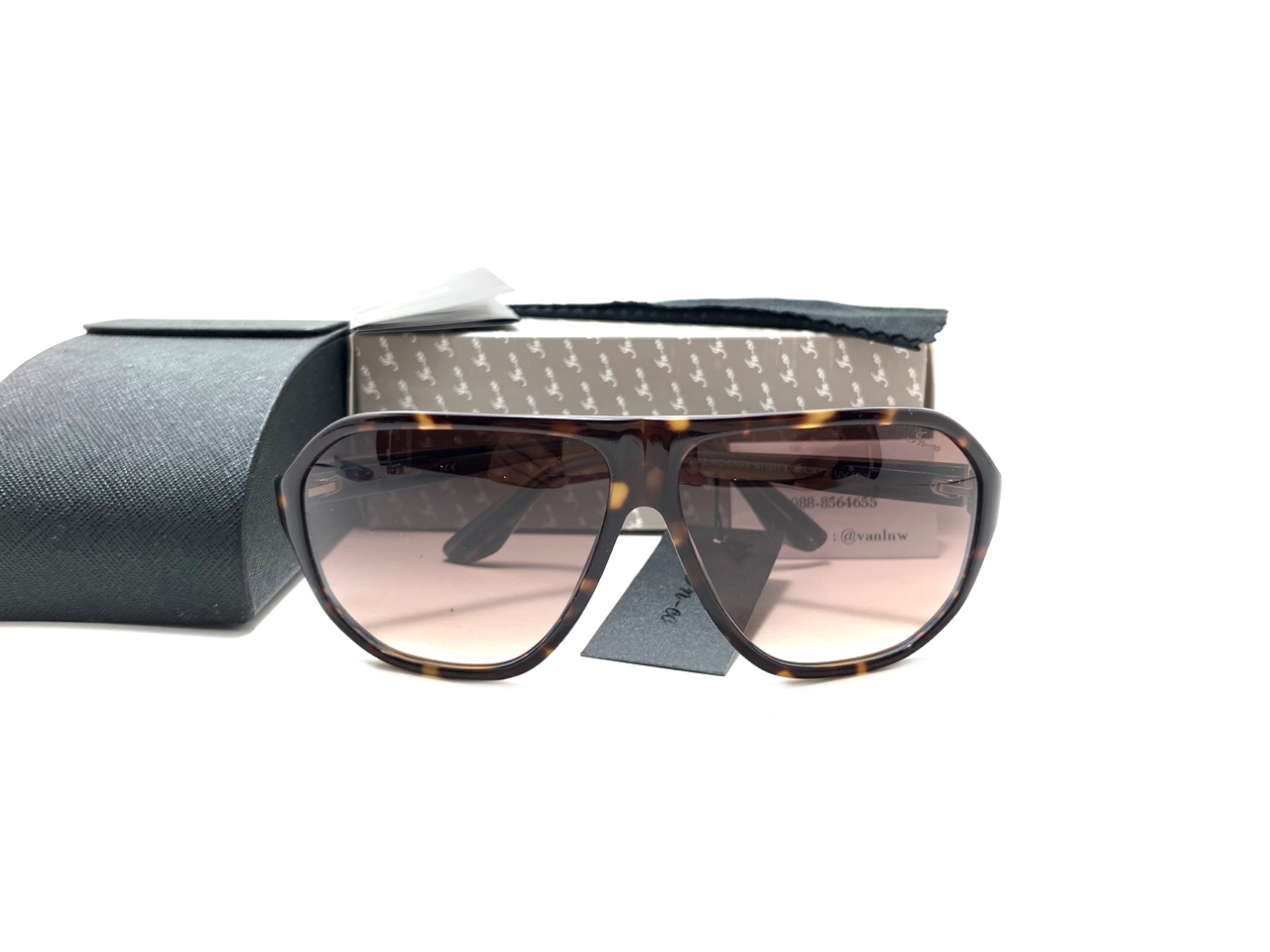 แว่นกันแดด FN-CO 8208012 AC-CR39 61-11-135 CAT2 <กระ>