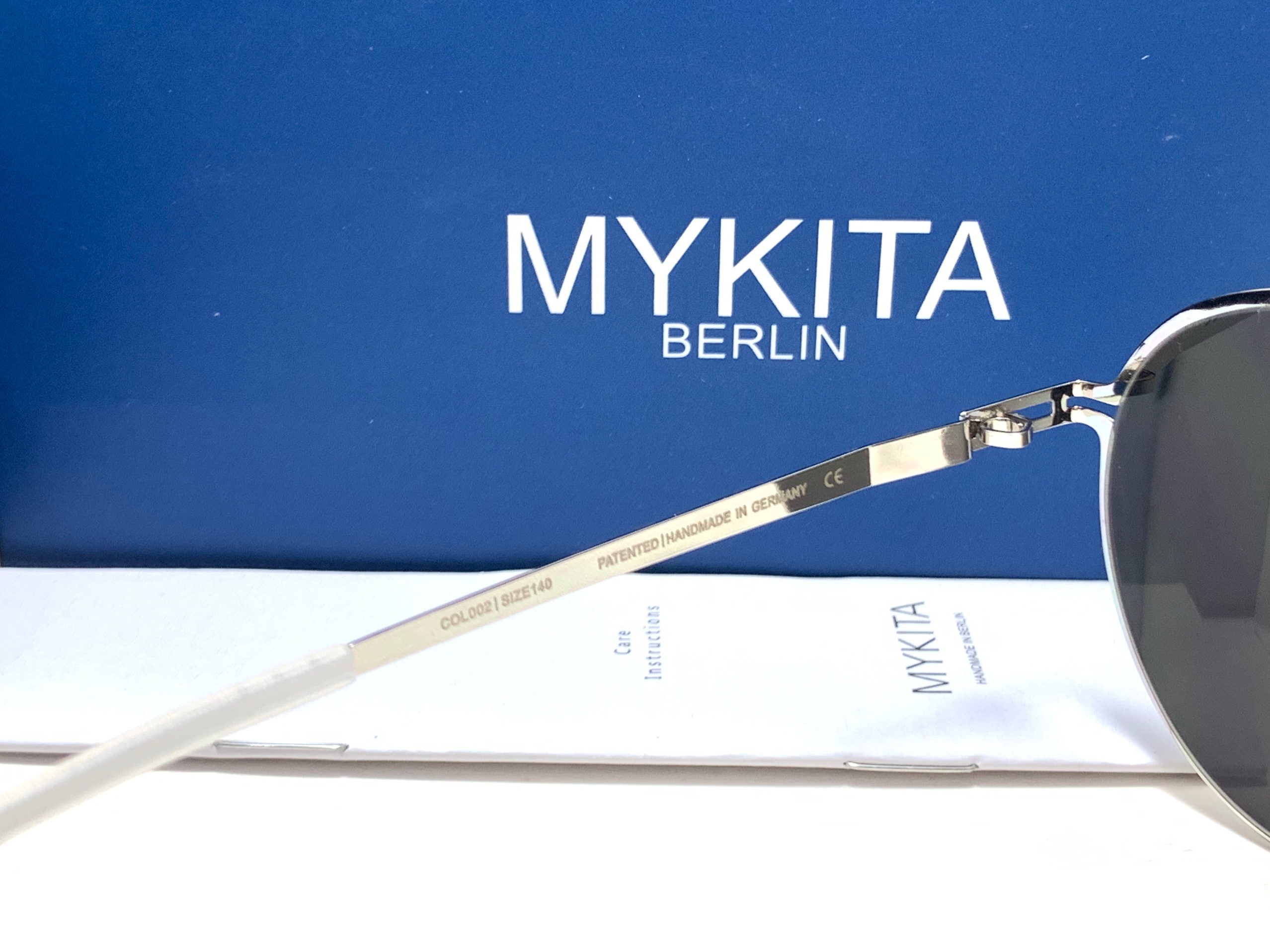 แว่นกันแดด MYKITA JOLAN COL.002 57-18 140 <ปรอทเงิน>