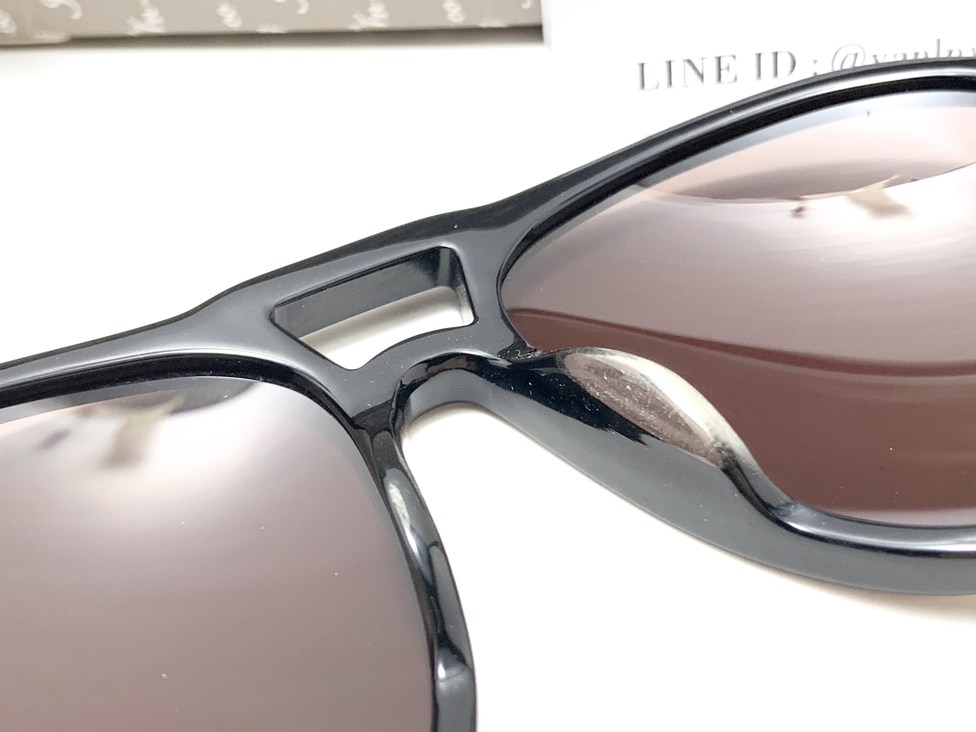 แว่นกันแดด FN-CO 8208033 AC-CR39 56-16 125 CAT2 <ดำ>